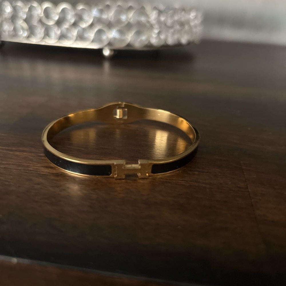 Elegant Gold and Black Bracelet